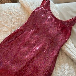 Women vintage right at the knee sequins dress. Size XL in perfect condition.